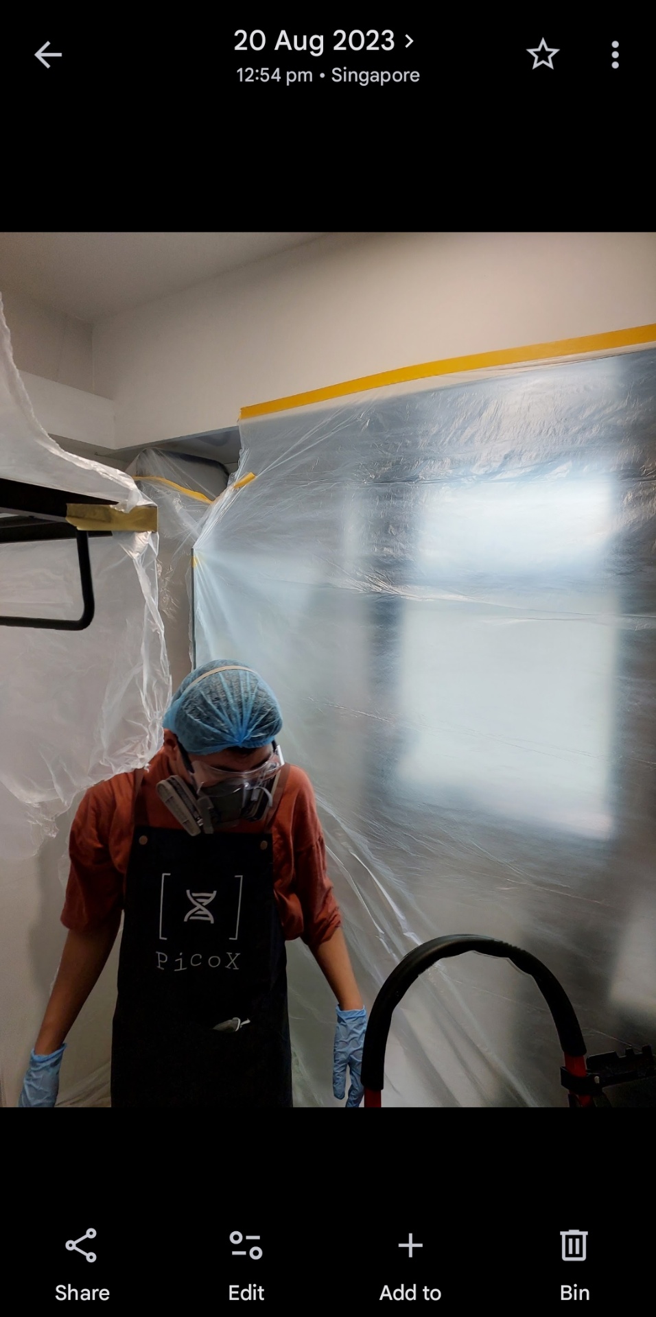 Pico X Health technician prepares professional containment zone with plastic sheeting for mould remediation - Singapore